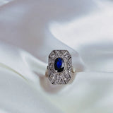 Anillo de Compromiso Art Deco con Zafiro Azul y Diamantes