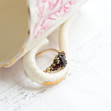 Vintage ring with 3 garnets