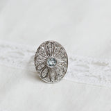 Vintage Ring mit zentralem Aquamarin und Diamanten