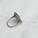 Vintage Ring mit zentralem Aquamarin und Diamanten
