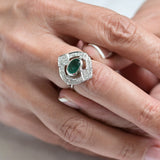 Art-déco-Ring mit zentralem Smaragd