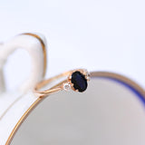 Vintage sapphire ring with two diamonds