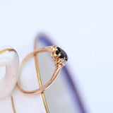 Vintage sapphire ring with two diamonds