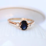 Vintage sapphire ring with two diamonds