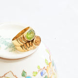 Band citrine and peridot ring