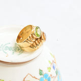 Band citrine and peridot ring