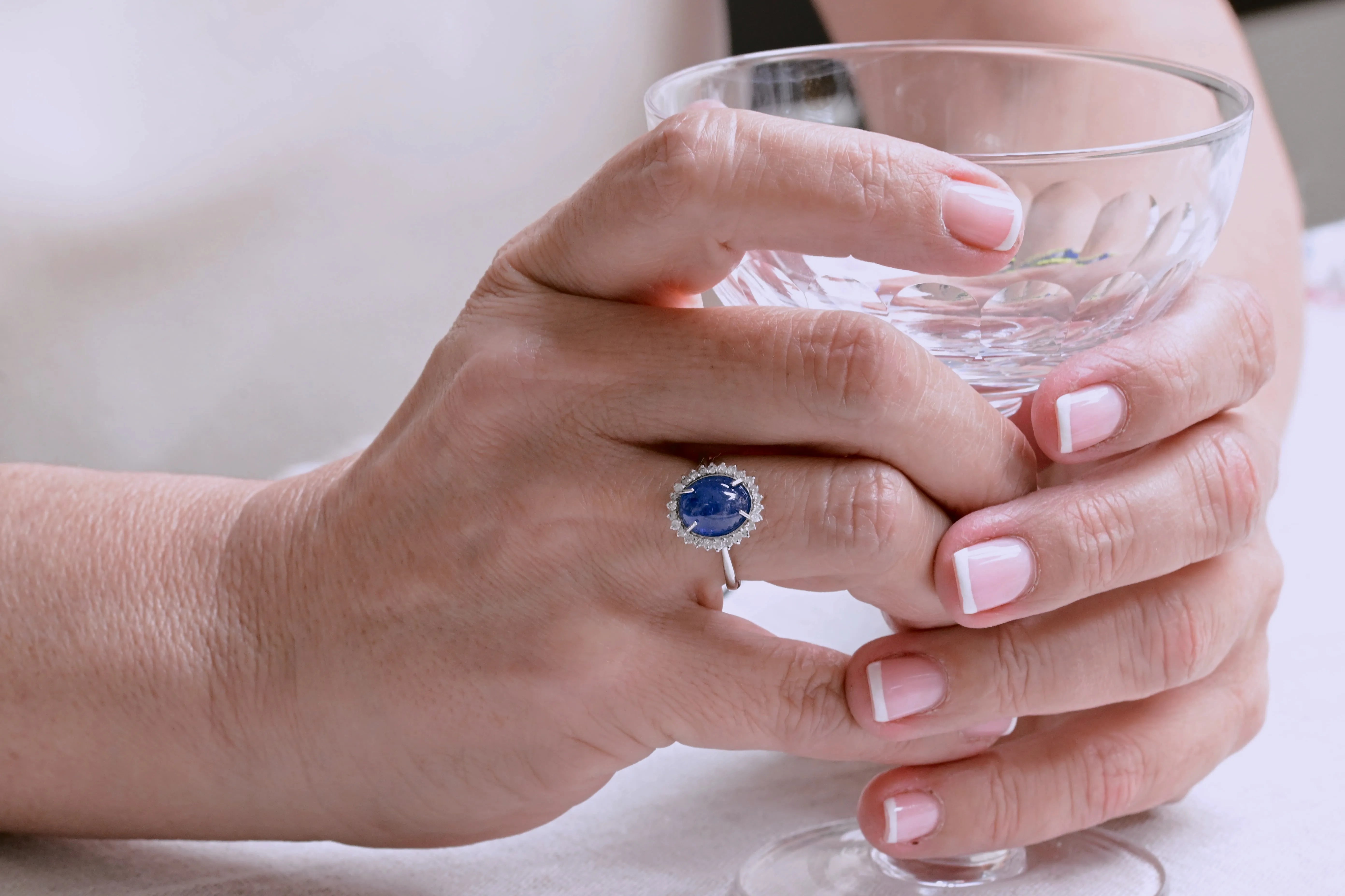 Mid-20th century engagement tanzanite ring with a central 3.70 ct tanzanite and 26 brilliant-cut diamonds set in 18K white gold.