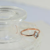 Bague en or rose 14K avec aigue-marine