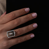 Art Deco Onyx Ring in 18K white gold, featuring a central Pakistan onyx and 28 diamonds. Certified with free resizing.