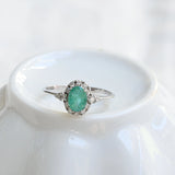 Vintage emerald and diamond rosette ring