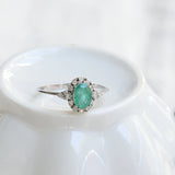 Vintage emerald and diamond rosette ring
