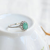 Vintage emerald and diamond rosette ring