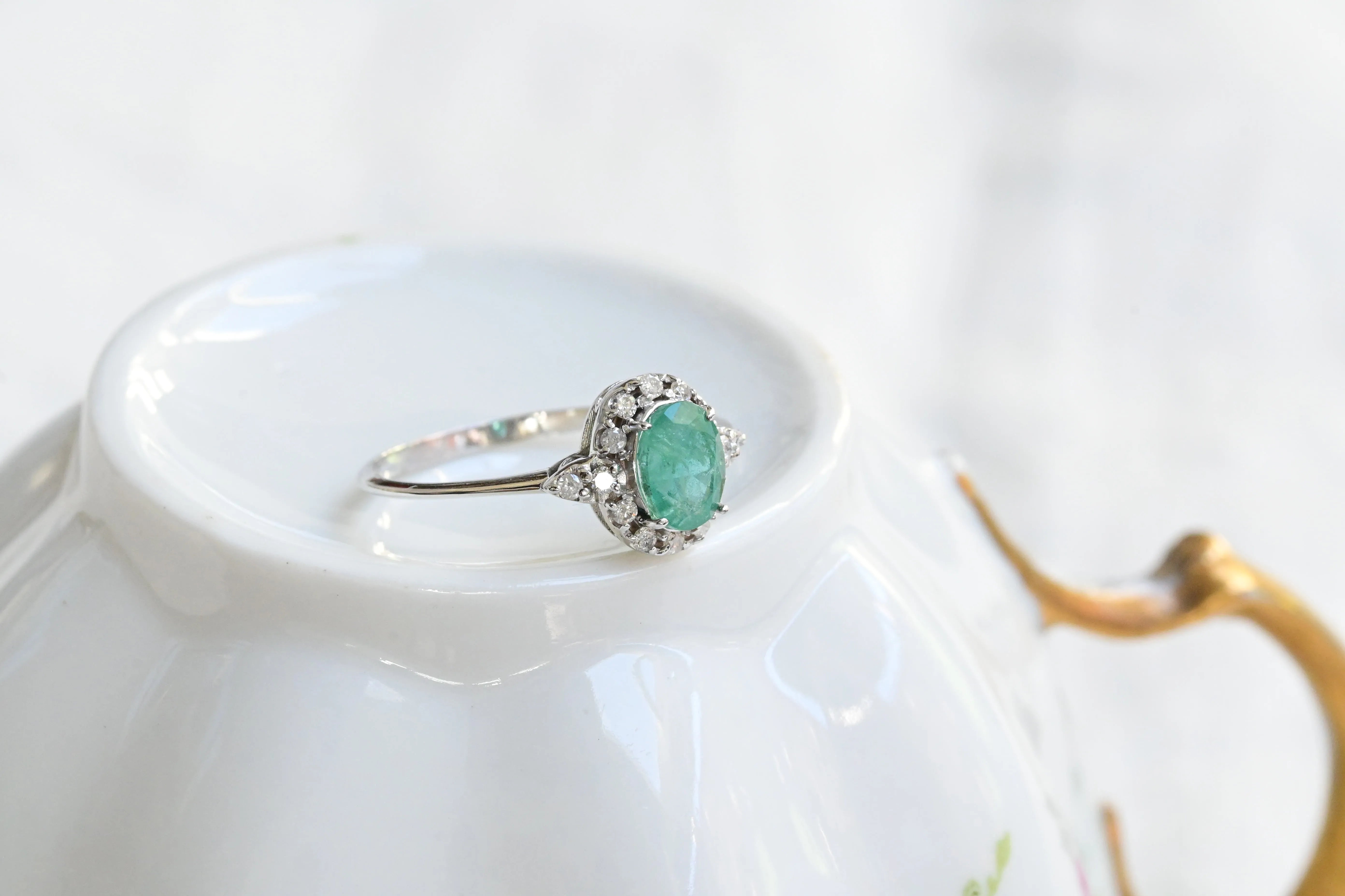 Vintage emerald and diamond rosette ring