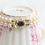 Vintage pearl bracelet with amethyst flower clasp