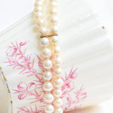 Vintage pearl bracelet with amethyst flower clasp