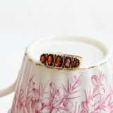 Vintage garnet five stone ring