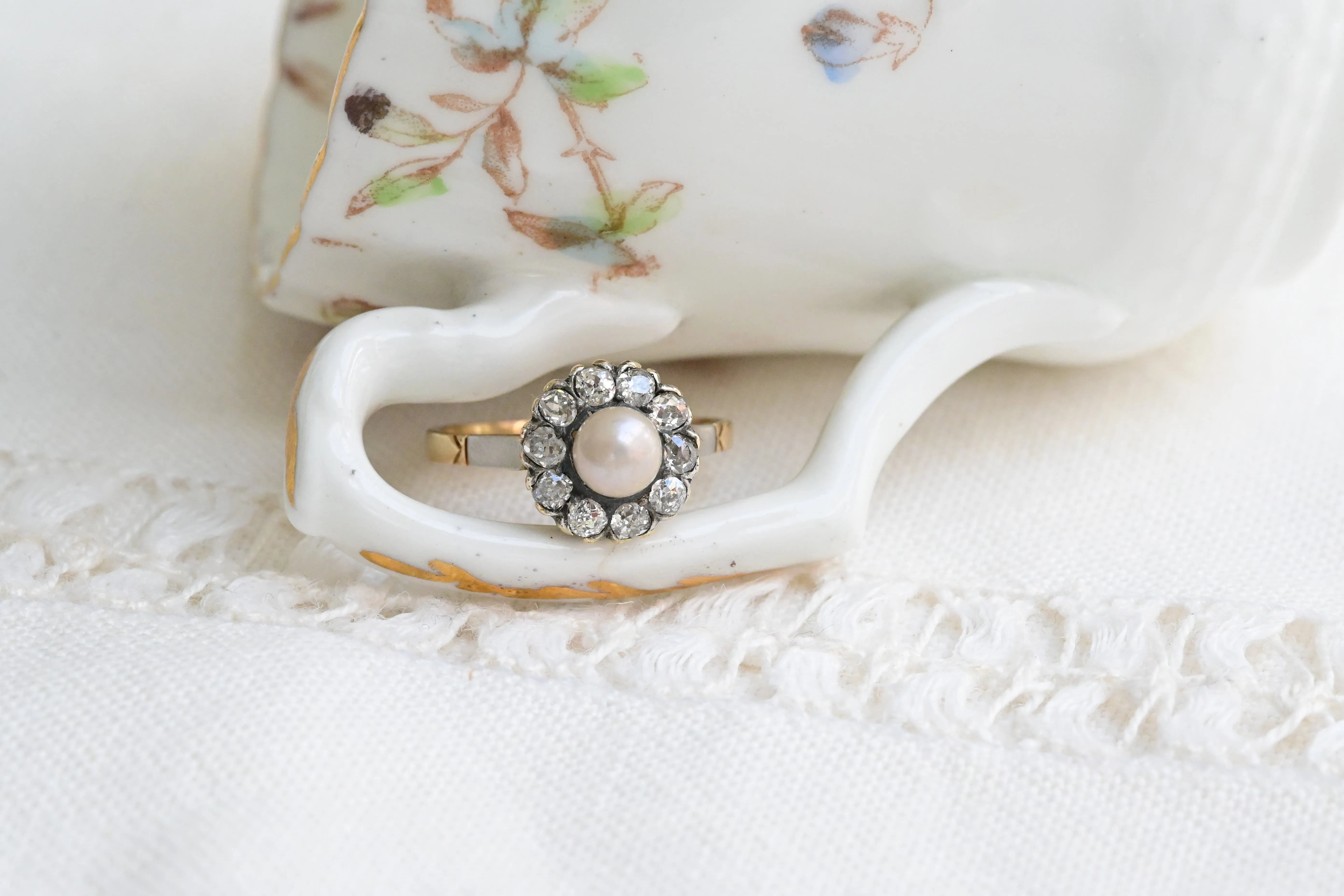 Art deco pearl rosette with diamonds