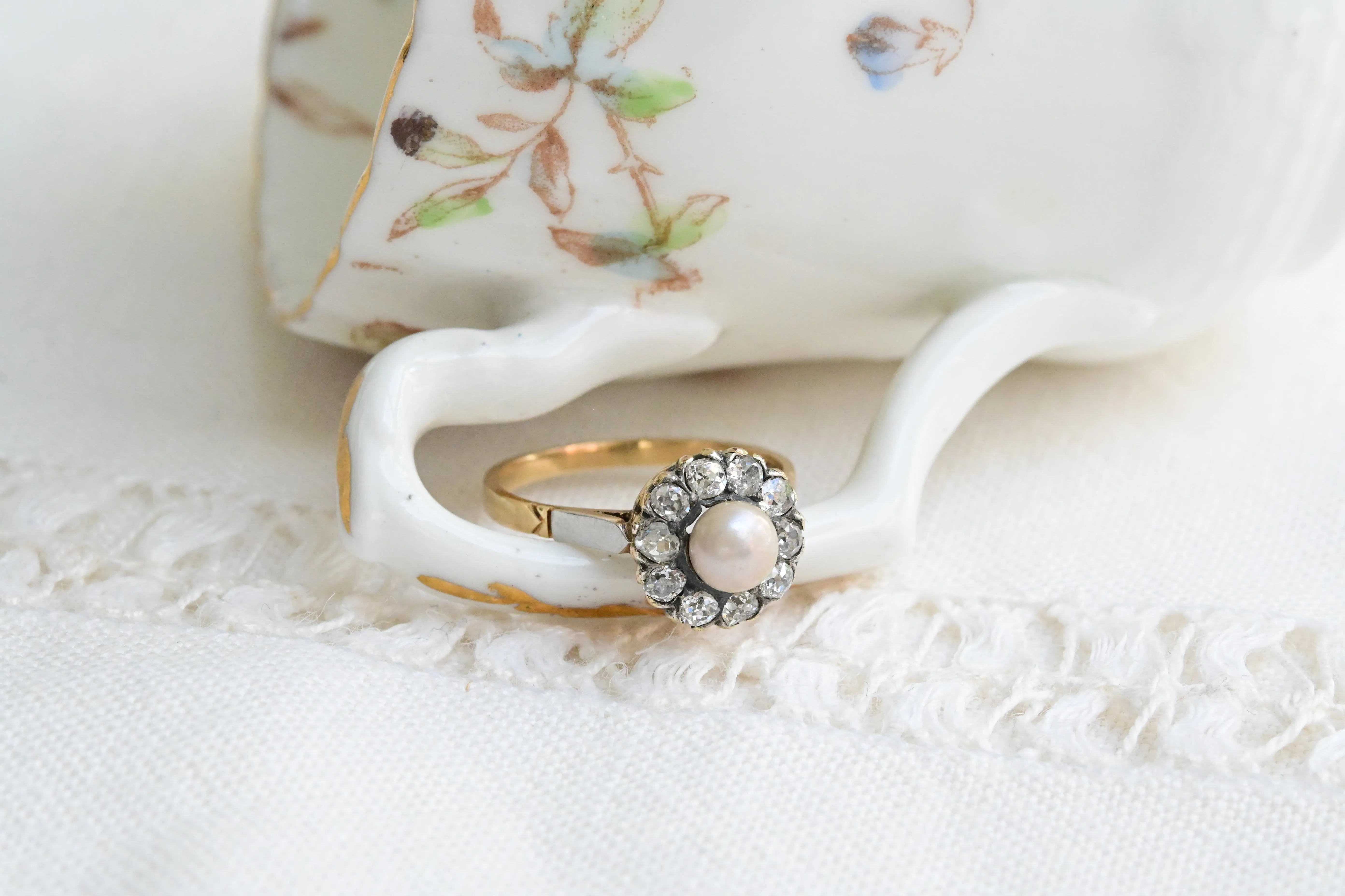 Art deco pearl rosette with diamonds
