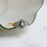 Art deco target ring with sapphire and diamonds
