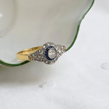 Art deco target ring with sapphire and diamonds