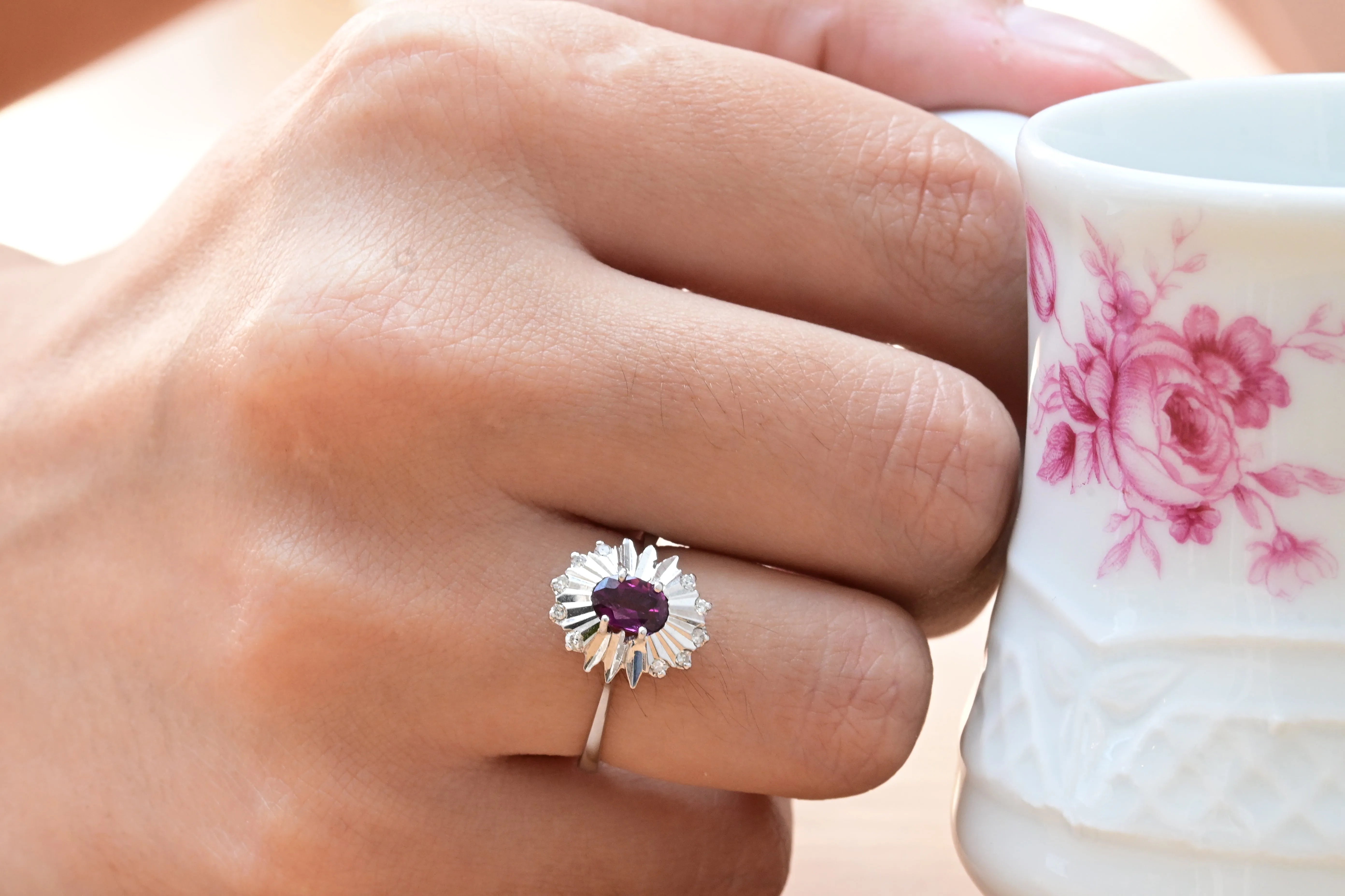 Vintage Ring with Central Oval Purple Sapphire and 10 Octagonal Cut Diamonds in 18K White Gold