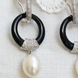 Vintage pearl earrings with diamonds