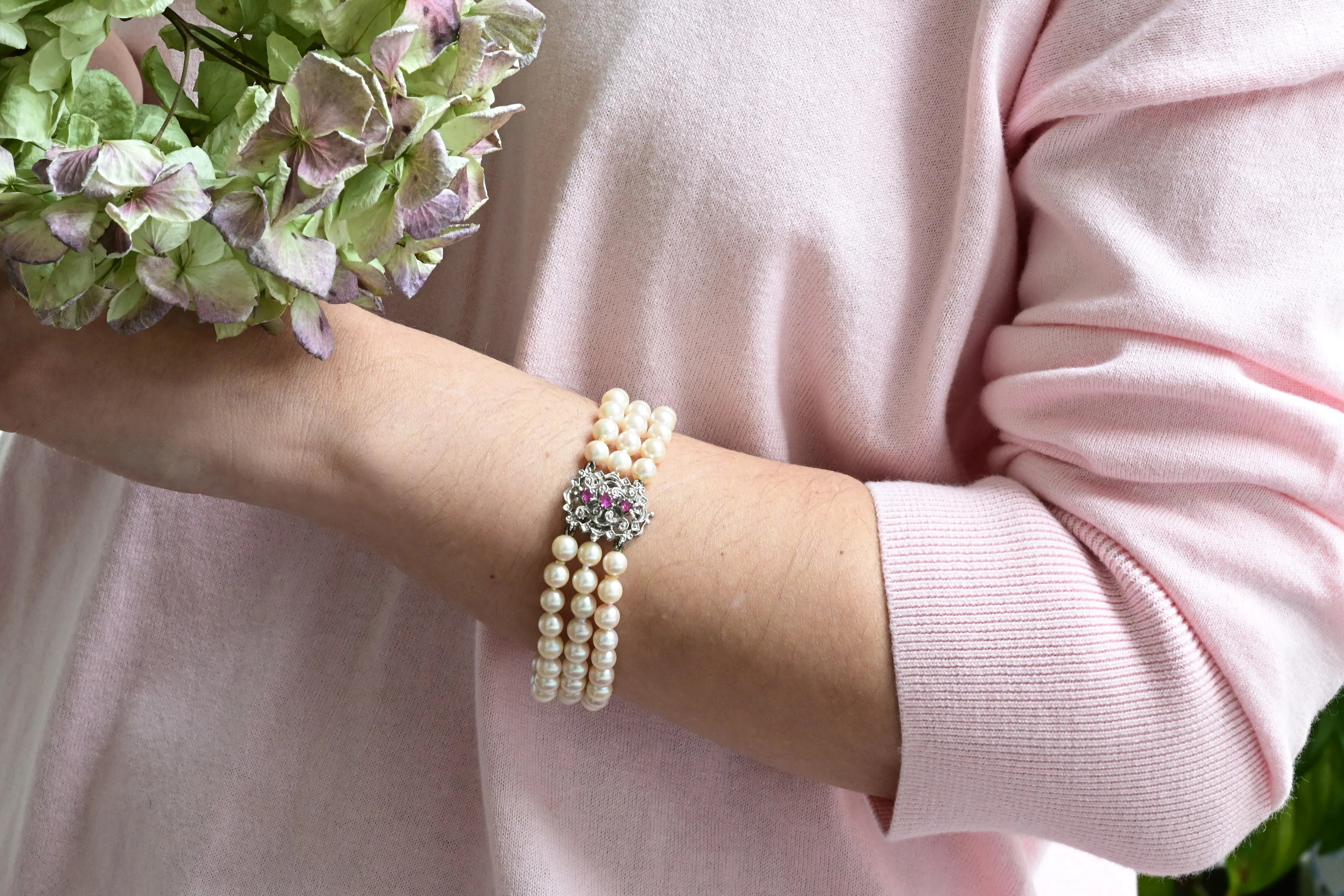 Akoya pearl bracelet with rubies and white gold clasp.