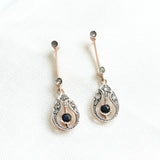 Vintage earrings composed by 14 rose cut diamonds and 2 round cut sapphires.&nbsp;