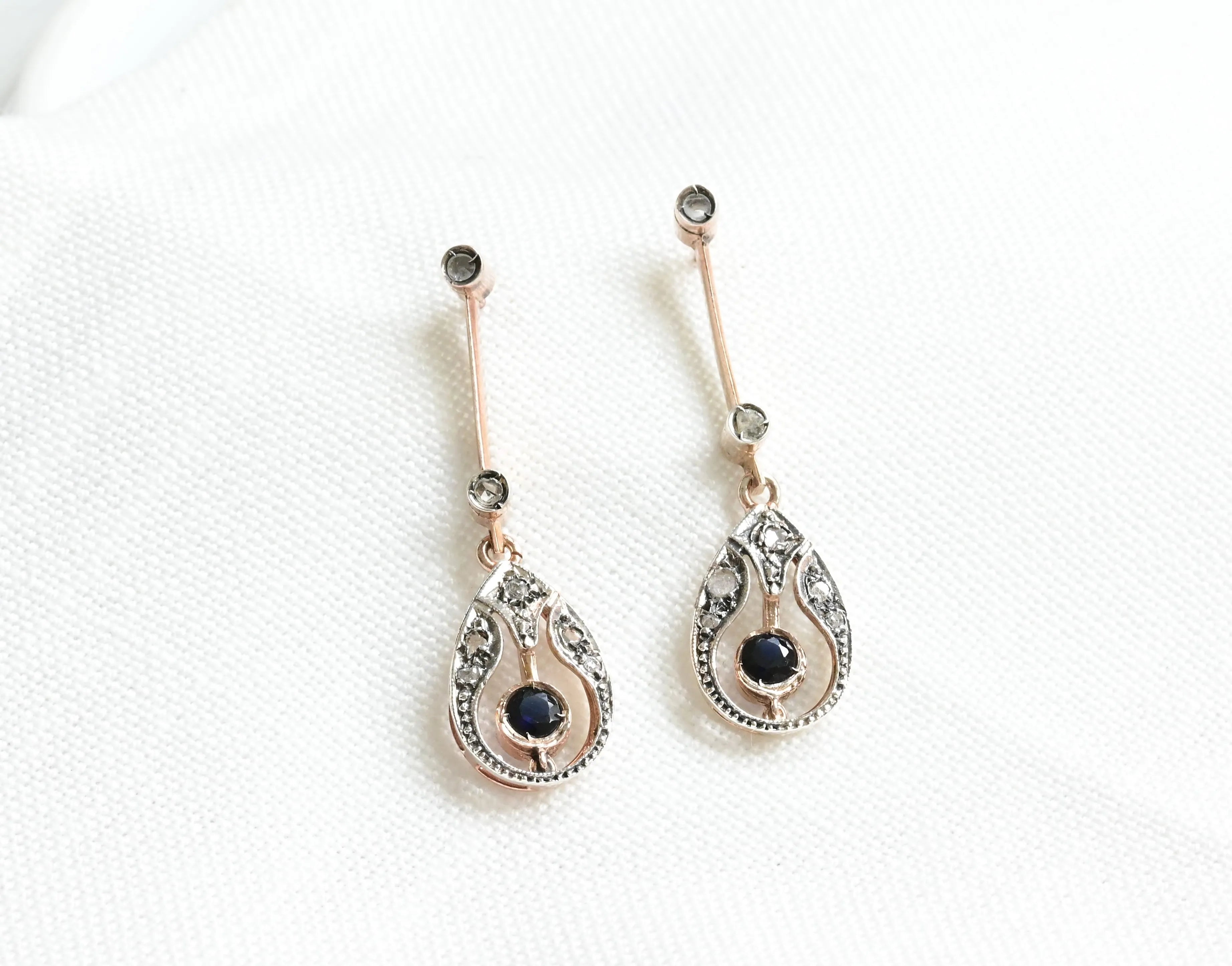 Vintage earrings composed by 14 rose cut diamonds and 2 round cut sapphires.&nbsp;