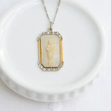 Art deco necklace with religious motif carved in mother of pearl