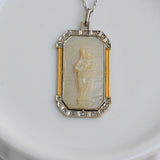 Art deco necklace with religious motif carved in mother of pearl