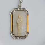 Art deco necklace with religious motif carved in mother of pearl