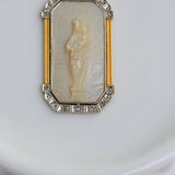 Art deco necklace with religious motif carved in mother of pearl