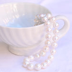 Vintage Edison white pearls necklace with hidden white gold clasp.