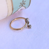 Bague vintage "You and Me" avec diamants taille ancienne européenne et diamants taille rose en platine et or jaune 14K.