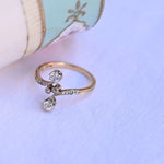 Vintage "You and Me" Ring mit Diamanten im alten europäischen Schliff und Rosenschliff, in Platin und 14K Gelbgold.