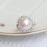 Vintage ring, with central Mabe pearl and diamonds