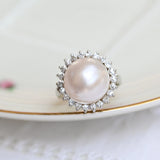 Vintage ring, with central Mabe pearl and diamonds