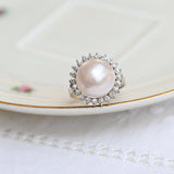 Vintage ring, with central Mabe pearl and diamonds