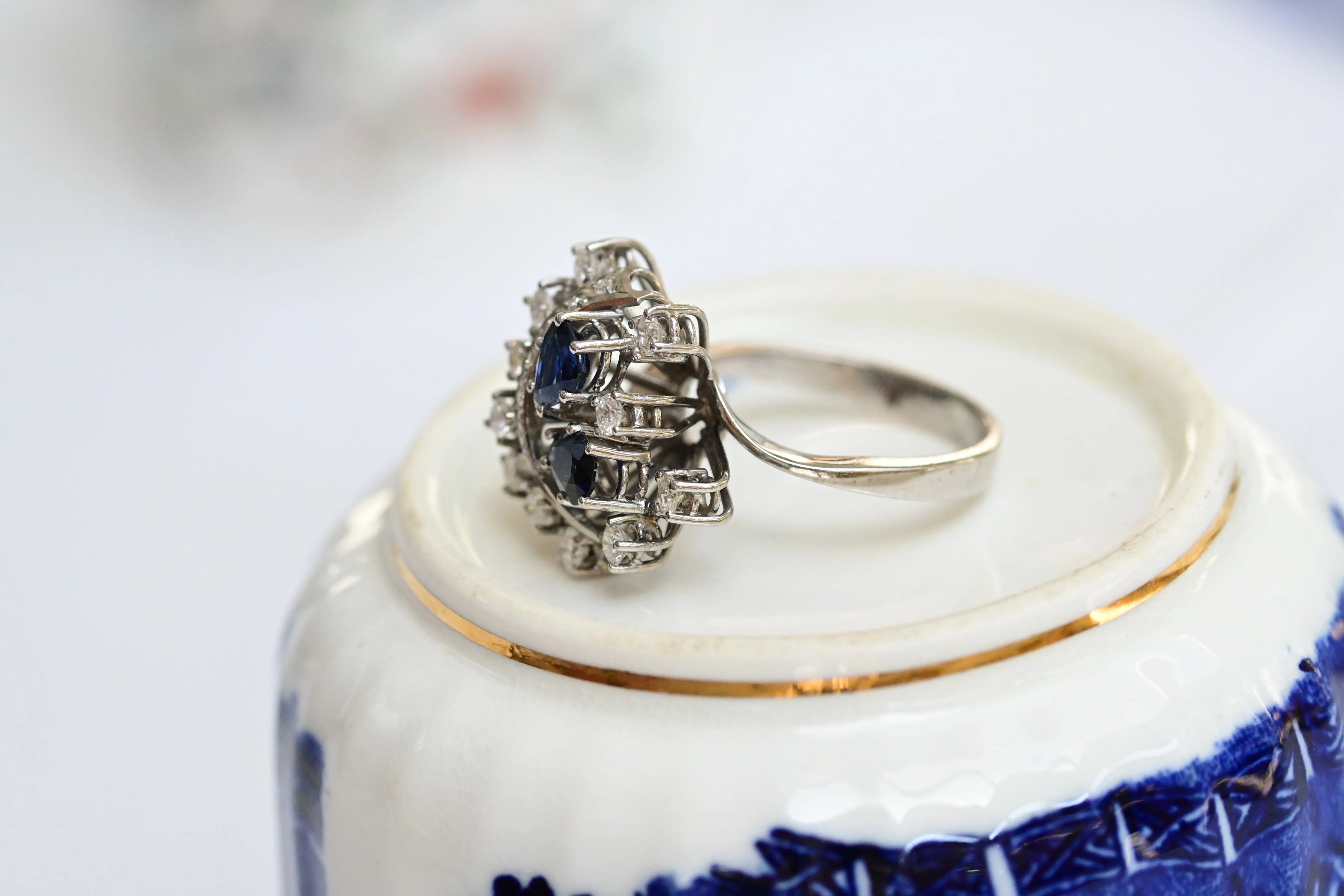 Cocktail ring featuring pear-cut blue-violet sapphires and diamonds