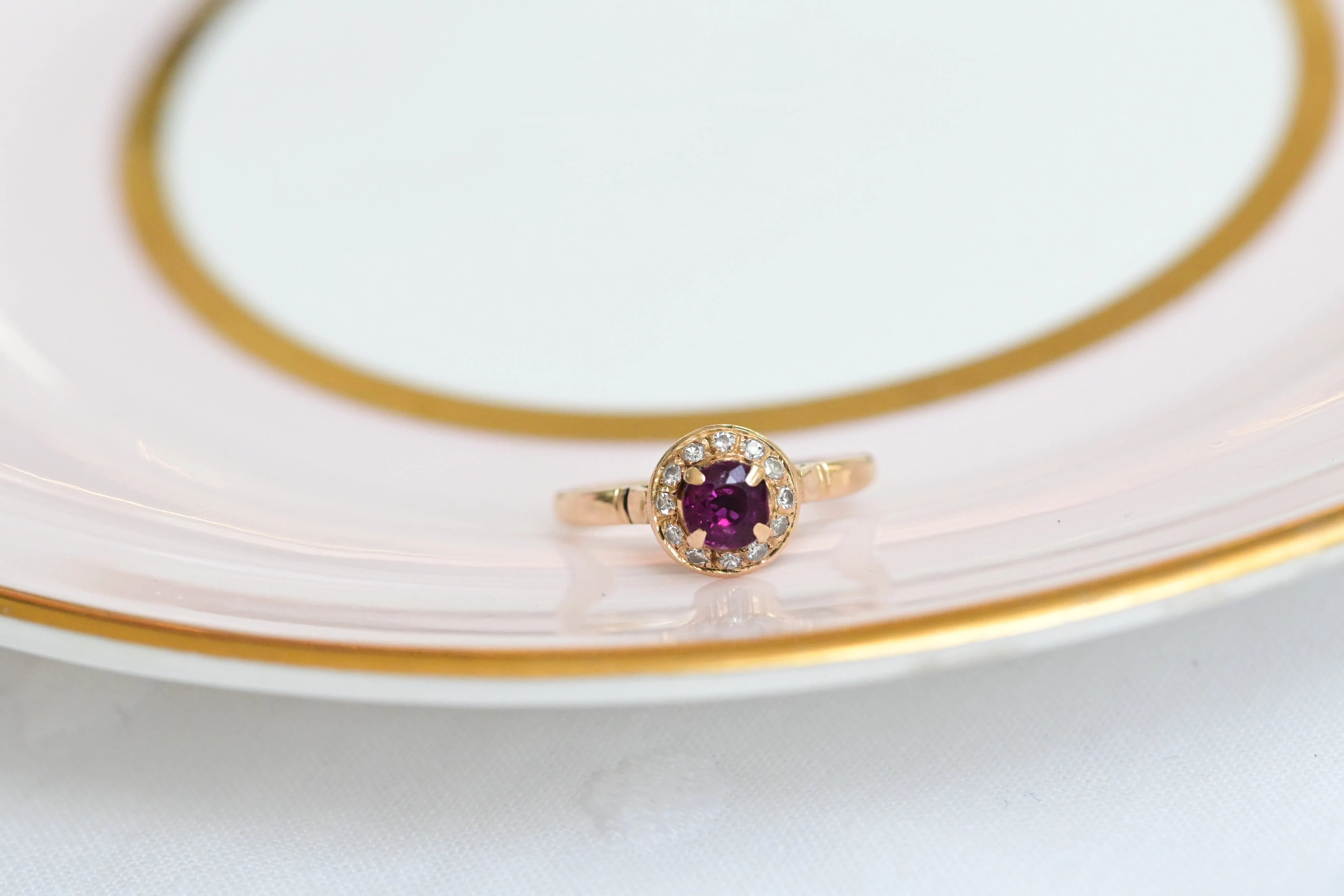 Vintage Yellow Gold Entourage Ring Featuring a Ruby and Diamond.