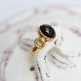 Vintage garnet ring in yellow gold from the 80s