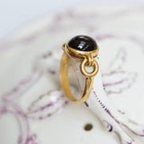 Vintage garnet ring in yellow gold from the 80s