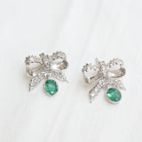 Ribbon earrings, with light deep green emeralds and diamonds