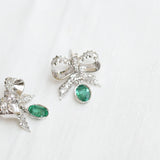 Ribbon earrings, with light deep green emeralds and diamonds