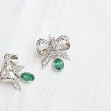 Ribbon earrings, with light deep green emeralds and diamonds