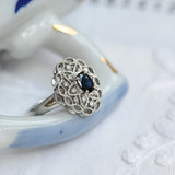 Vintage platinum ring, with central sapphire and diamonds