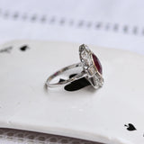 Bague de style Art déco avec rubis central et diamants