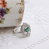 Art deco ring with central emerald