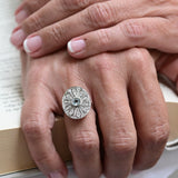 Bague vintage avec aigue-marine centrale et diamants